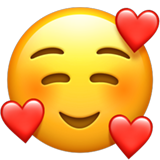 Усміхнене обличчя із сердечками