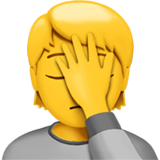 Людина торкається голови